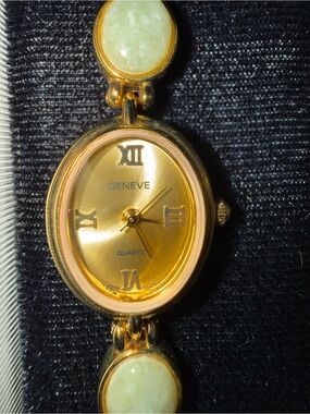 Geneve Gold-Tone Women's Quartz Bracelet Watch with Pale Green Stone Accents